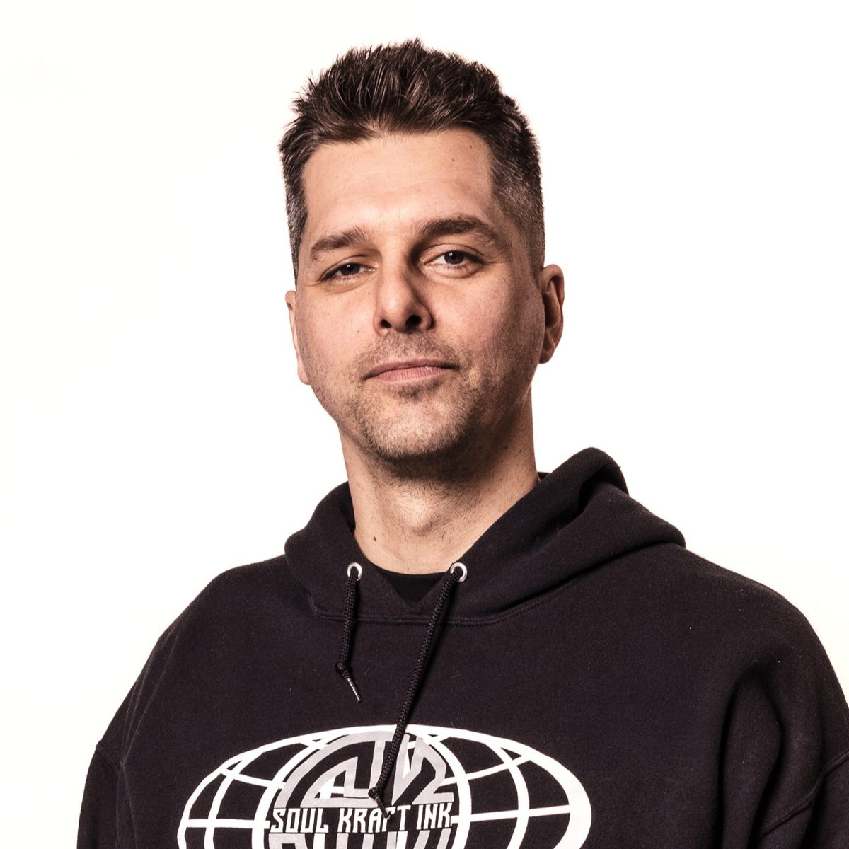 Portrait of Patrick Thomas, tattoo artist at Soul Kraft Ink