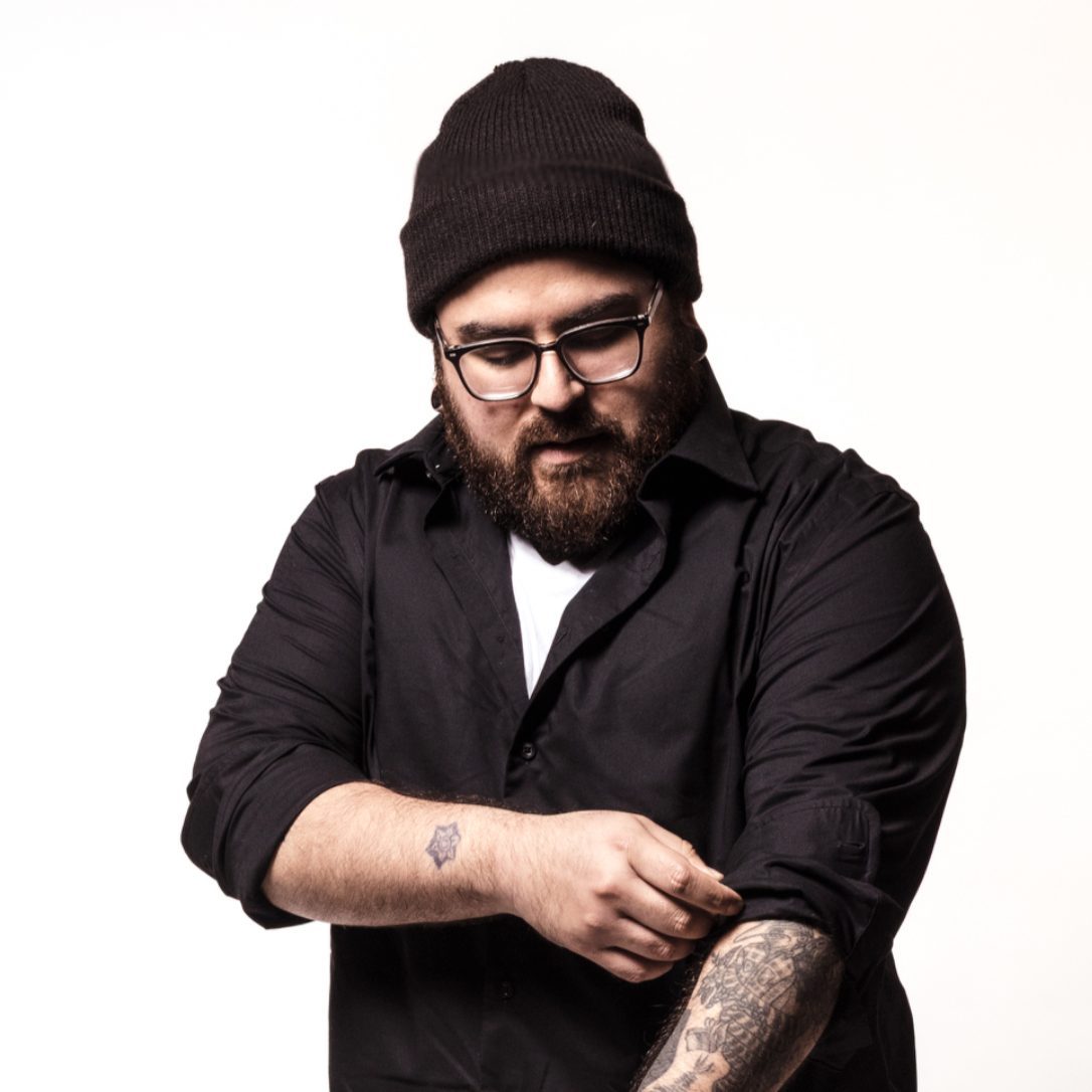 Portrait of Mike Alco, tattoo artist at Soul Kraft Ink